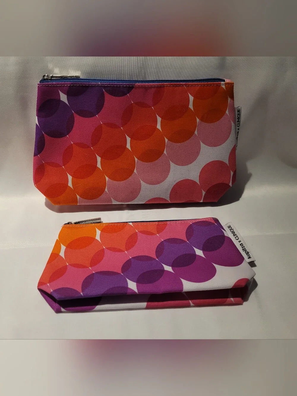 Clinique Set, Blue Hawaii, and Pink/Orange  Pouches.